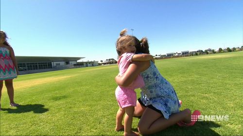 Seven-year-old Ella saved her little sister Emily from a dog attack.