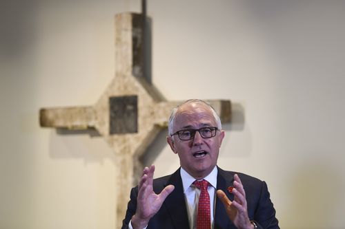 Prime Minister Malcolm Turnbull speaks in front of the Long Tan Cross during a ceremony today. (AAP)