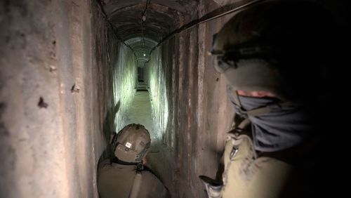 Israeli soldiers show the media an underground tunnel found underneath Shifa Hospital 
