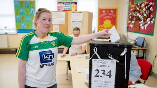 Marie O'Donnell casts her vote at Scoil Mhuire Gan Smal Polling Station. Picture: PA