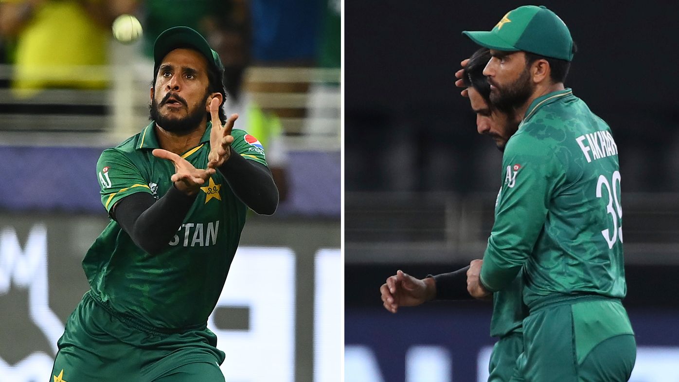 Hasan Ali&#x27;s dropped catch (left) turned the T20 World Cup semi final in Australia&#x27;s favour. He&#x27;s consoled by Fakhar Zaman after the match (right).