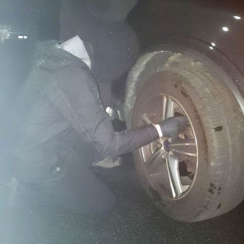 A member with Tyre Extinguishers lets down a tyre in Melbourne. 