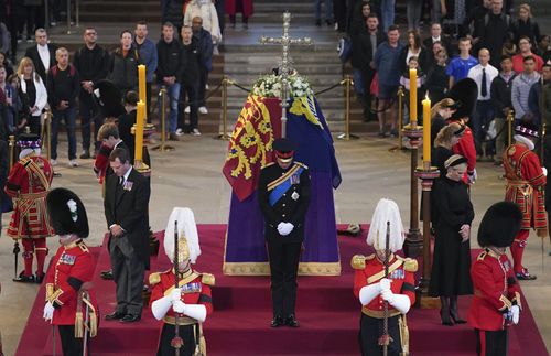 Queen Elizabeth II 's grandchildren, clockwise from front centre, Prince William, the Prince of Wales, Peter Phillips, James, Viscount Severn, Princess Eugenie, Prince Harry, the Duke of Sussex, Princess Beatrice, Lady Louise Windsor and Zara Tindall bow.
