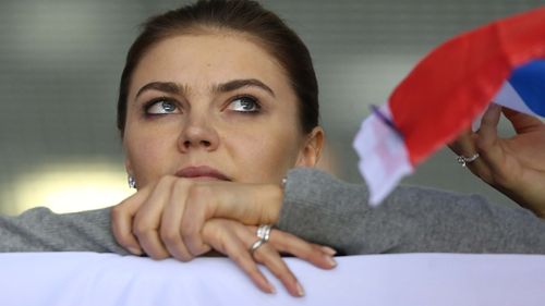 SOCHI, RUSSIA - FEBRUARY 16:  (CHINA OUT) Alina Kabaeva, Russian Olympic champion in rhythmic gymnastics watches the men's Preliminary Round Group A ice hockey match Russia vs Slovakia at Bolshoi Ice Palace at the 22nd Winter Olympic Games on February 16, 2014 in Sochi, Russia.  (Photo by Visual China Group via Getty Images/Visual China Group via Getty Images)