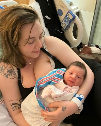 Odele Ventimiglia and her newborn daughter Shiloh in hospital bed.