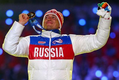 Russia's cross country skiers swept the blue riband 50km mass start.