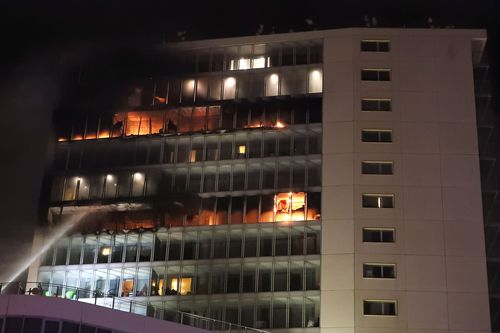 The cause of the blaze, which is burning across at least five floors, is currently unknown. (AAP)