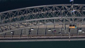 An aerial view of the Sydney Harbour Bridge on April 22, 2020 in Sydney, Australia. Stay-at-home orders have seen a reduction in traffic on the normally busy bridge. (Photo by Ryan Pierse/Getty Images)