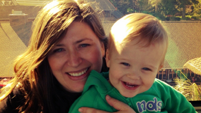 Louise and son smiling in the sun