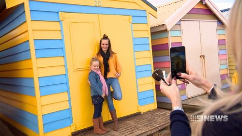 Tourists flock to the eye-catching bathing boxes on a regular basis. Picture: 9NEWS