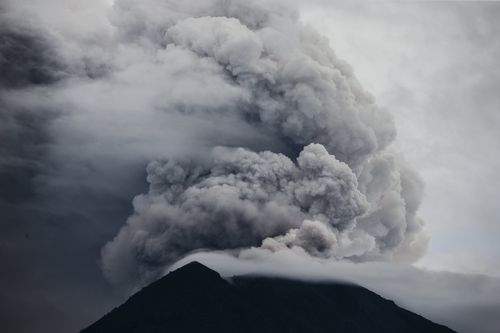 Mount Agung volcano spewing hot volcanic ash as it is seen from Datah in Karangasem, Bali. (AAP)