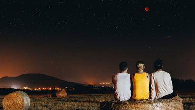 Viewers watching a lunar eclipse in Spain.