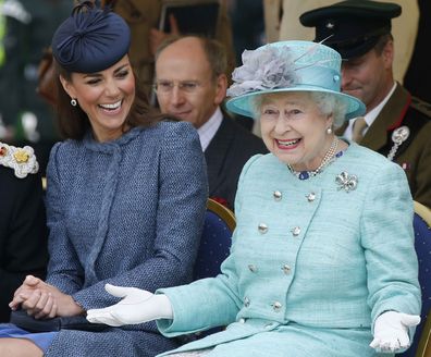 NOTTINGHAM, ENGLAND - JUNE 13:  Catherine, Duchess of Cambridge and Queen Elizabeth II watch part of a children's sports event while visiting Vernon Park during a Diamond Jubilee visit to Nottingham on June 13, 2012 in Nottingham, England.  (Photo by Phil Noble - WPA Pool/Getty Images)