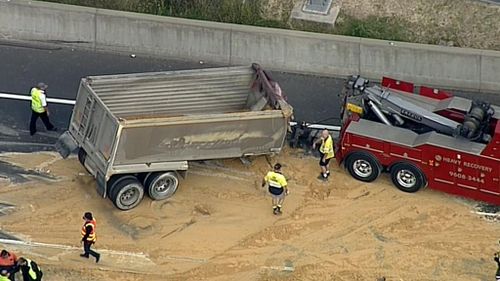 Truck rollover causes traffic delays on major road  in Sydney’s west