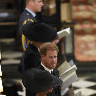 Prince William, Kate, Princess of Wales, Prince Harry and Meghan, Duchess of Sussex attend the committal service for Queen Elizabeth II at St George's Chapel.