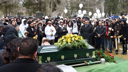 Friends and family of homicide victim Valerie Reyes attend her burial at Greenwood Union Cemetery.