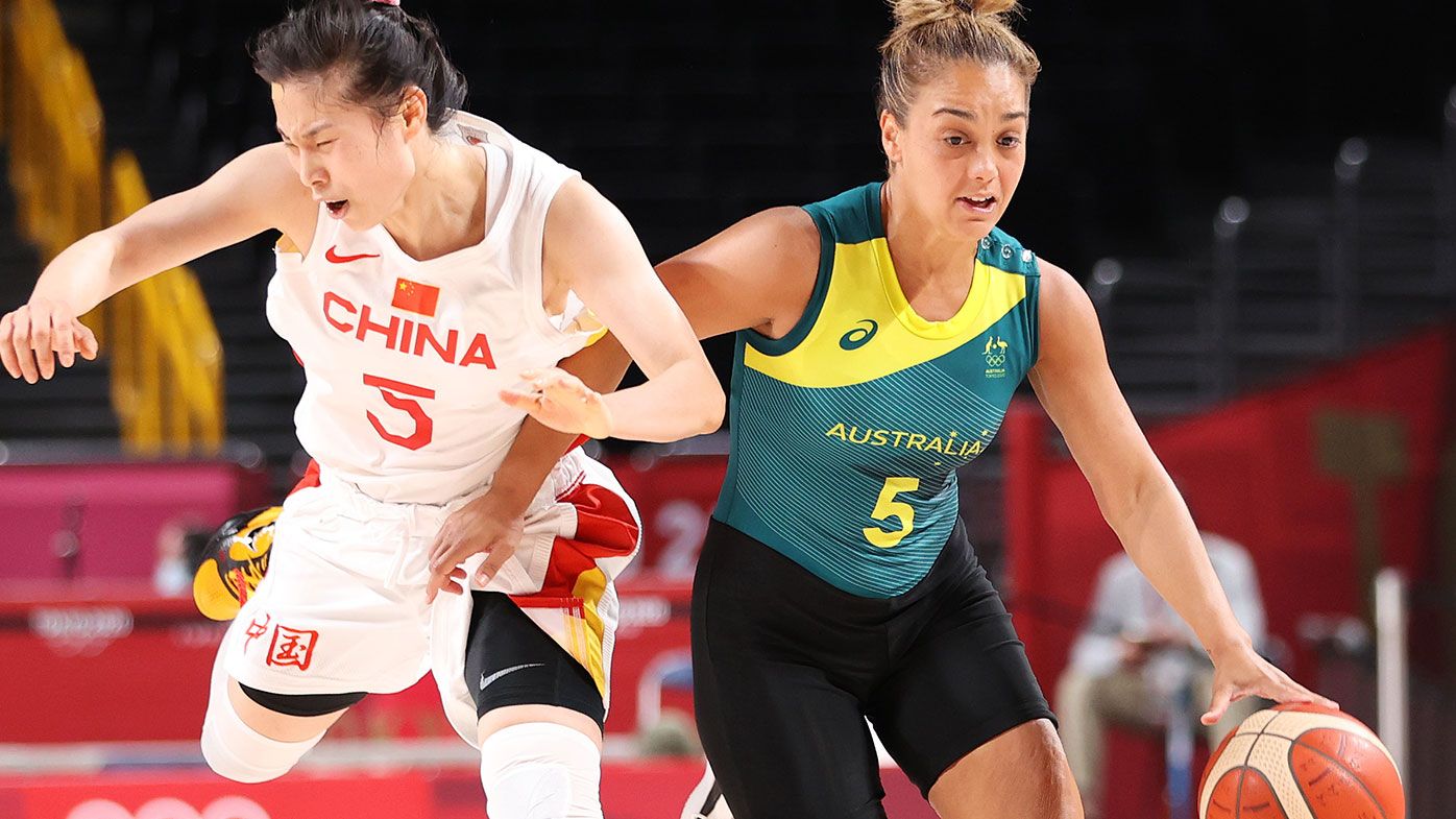 Leilani Mitchell of Team Australia drives past Siyu Wang of Team China at the Tokyo Olympics.