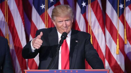 Republican president-elect Donald Trump gives a thumbs up during his acceptance speech on November 9, 2016 in New York City. (AFP)