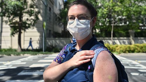 St Vincent's Hospital Wards Person Supervisor Eliza Attwood after receiving the Pfizer COVID-19 vaccine at RPA in Sydney.