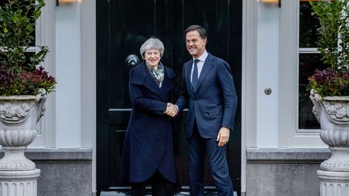 British Prime Minister Theresa May is greeted by Dutch Prime Minister Mark Rutte upon her arrival in The Hague, Netherlands.