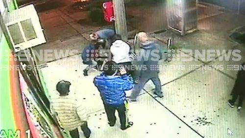 Quick-thinking witnesses bring the man to the ground and hold him down with a shopping trolley. 