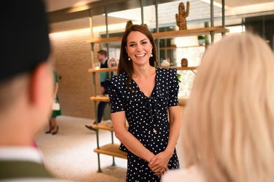 Catherine, Princess of Wales speaks with members of staff during a visit of the new facilities of "Hope Street" during its opening on June 27, 2023 in Southampton, England 