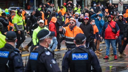 The Age, News, 20/09/2021, photo by Justin McManus. Construction workers protest outside the office of the CFMEU against mandatory vaccines in the construction industry.