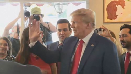 Donald Trump mingles with supporters in Miami's "Little Havana" after a court appearance.