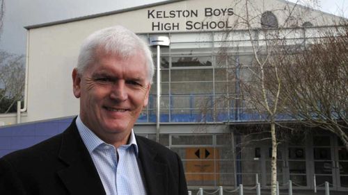 Doug McKay outside his old school in Auckland.