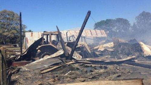 A farmer's shed destroyed by fire in Victoria's north-east. (Alexis Daish, 9NEWS)