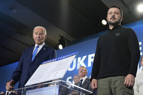 President Joe Biden, left, and President of Ukraine Volodymyr Zelenskyy at he NATO Summit.