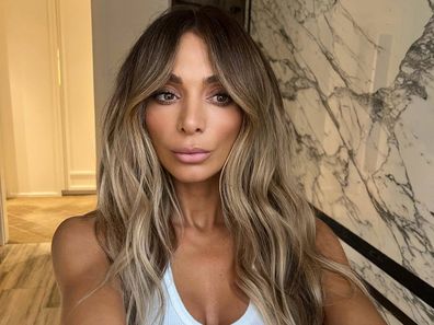 Nadia Bartel shows off her long hair.