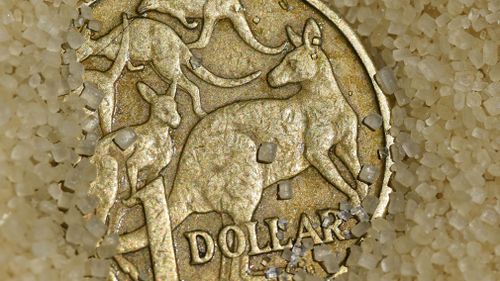 Australian dollar slides after hitting two-year high