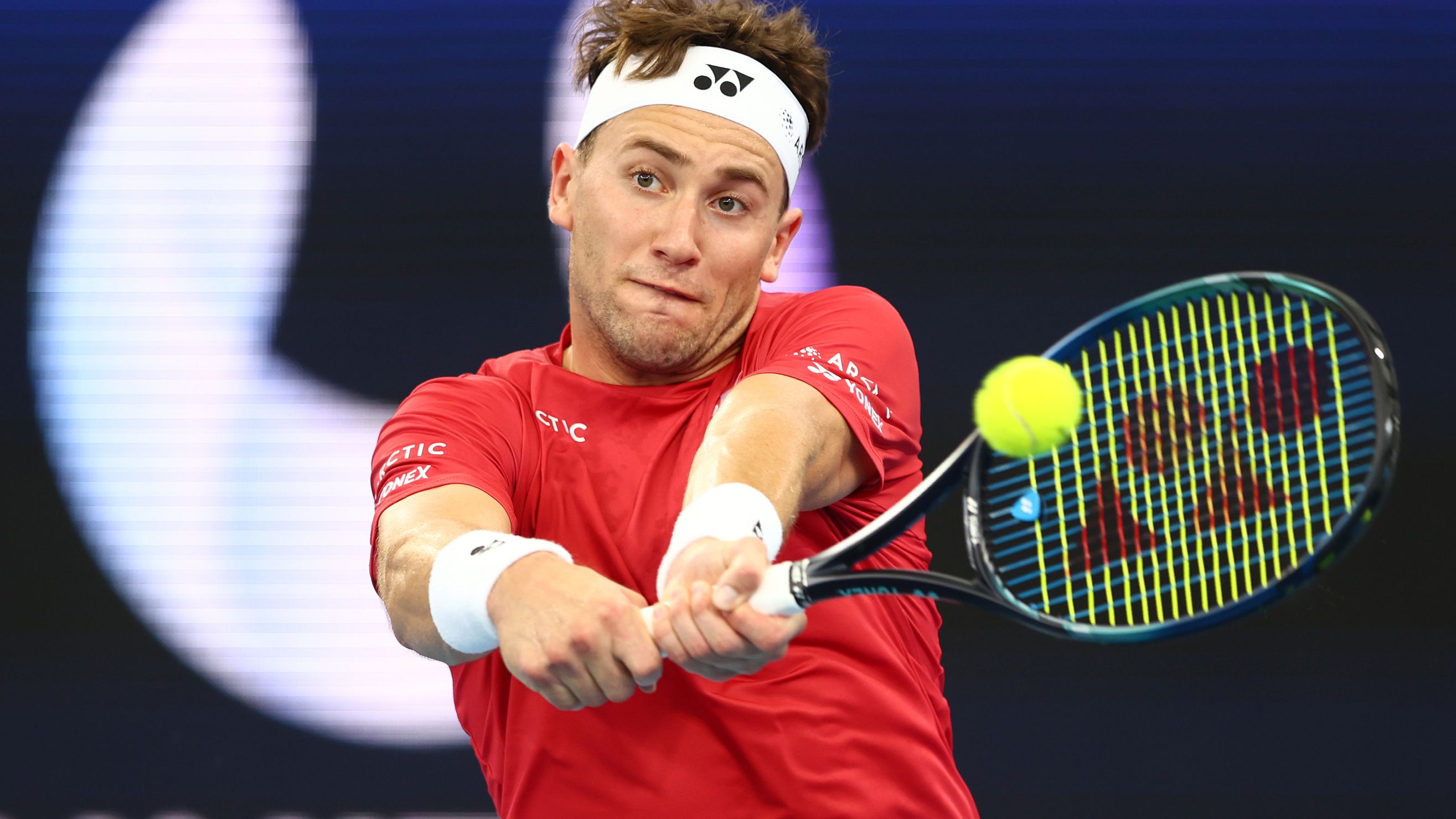BRISBANE, AUSTRALIA - JANUARY 01: Casper Ruud of Norway plays a backhand in his match against Thiago Monteiro of Brazi during day four of the 2023 United Cup at Pat Rafter Arena on January 01, 2023 in Brisbane, Australia. (Photo by Chris Hyde/Getty Images)