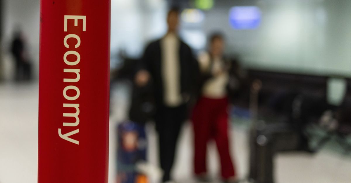 Man charged with missing woman's murder after airport arrest