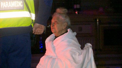 The elderly woman's son woke her and got her to safety about 2.15am. (9NEWS)