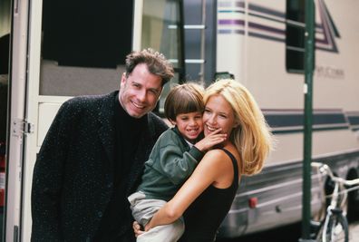 Actress Kelly Preston gets a visit from husband John Travolta and son Jett while on location filming the 1997 motion picture Addicted to Love