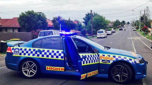 Police have blocked Regent Street in Reservoir after an alleged car thief was chased by the owner. (Andrew Nelson, 9NEWS)