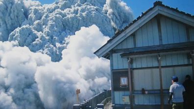 Before he died, hiker Izumi Noguchi took this photo showing gas and ash gushing from the summit crater at Mount Ontake. 