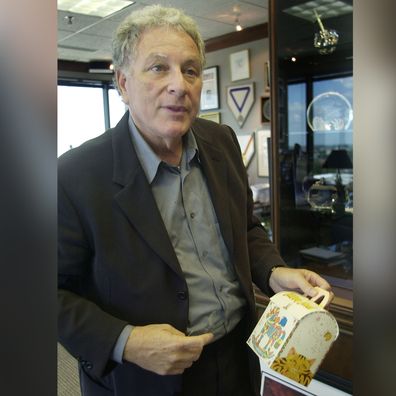 Bob Bernstein holds an original Happy Meal box at his office at Bernstein Rein Agency in Kansas City, Mo., Thursday, Aug. 5, 2004. Bernstein is the inventor of the Happy Meal, which is 25 years old. (AP Photo/Orlin Wagner)