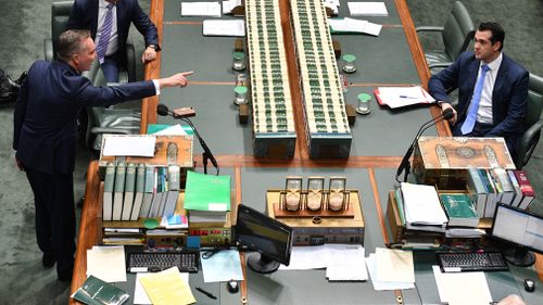 Mr Bowen confronts Michael Sukkar in the House of Representatives today. (AAP)