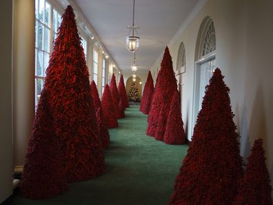 Melania Trump's red Christmas trees in the White House in 2018.