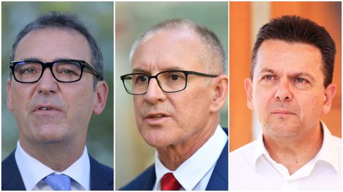 Liberal leader Steven Marshall (left), Premier Jay Weatherill (centre) and SA Best leader Nick Xenophon (right).