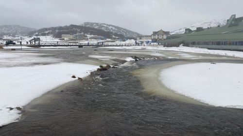 Heavy rains hit the New South Wales Alps, causing Perisher Creek to burst its levee.