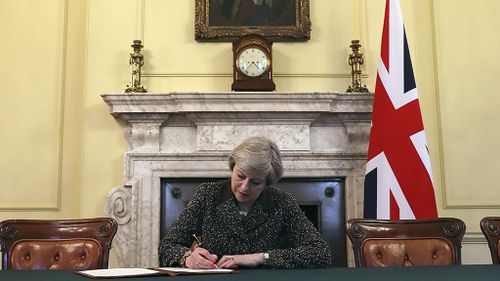 Theresa May signs letter that will officially begin UK’s exit from EU