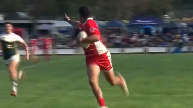 Latrell Mitchell celebrates as he goes in to score a 90m intercept try for Walgett at the Koori Knockout.