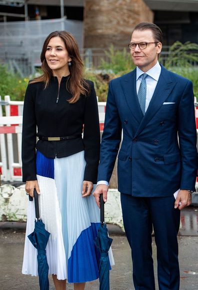 Princess Mary changes her shoes while out with Sweden's Crown Princess Victoria