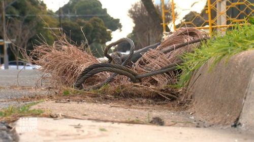 Three men have been charged after allegedly attempting to tow away more than 200 metres of copper cable from a Telstra communications pit in Adelaide. 