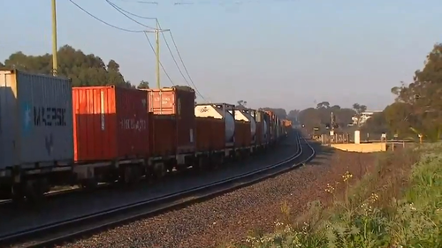 A cargo train has crashed into a car in Bibra Lake, in Perth's south this morning.