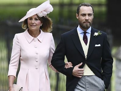 James Middleton (R), brother of the bride, walks with his mother Carole Middleton as they attend the wedding of Pippa Middleton and James Matthews at St Mark's Church in Englefield, west of London, on May 20, 2017. Pippa Middleton hit the headlines with a figure-hugging outfit at her sister Kate's wedding to Prince William but now the world-famous bridesmaid is becoming a bride herself. Once again, all eyes will be on her dress as the 33-year-old marries financier James Matthews on Saturday at a